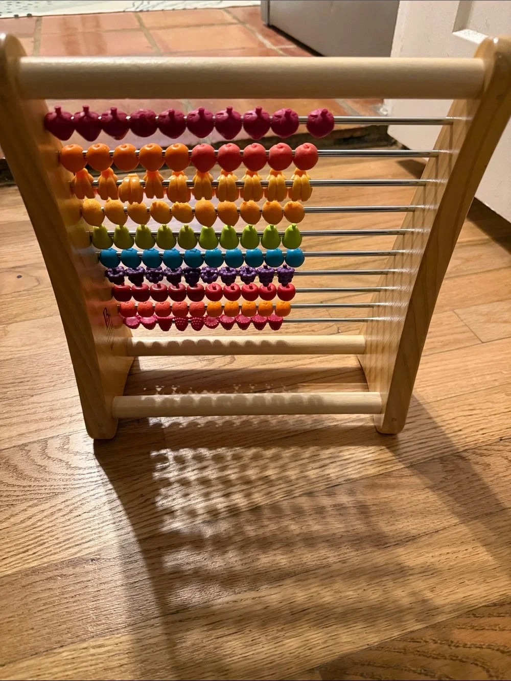 B. Toys Wooden fruit Counting Abacus - Multicolor like new